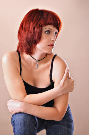 Portrait of the girl on a light grey background