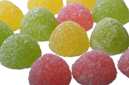 Multi-coloured jelly sweets close up on a white backgroundの写真素材