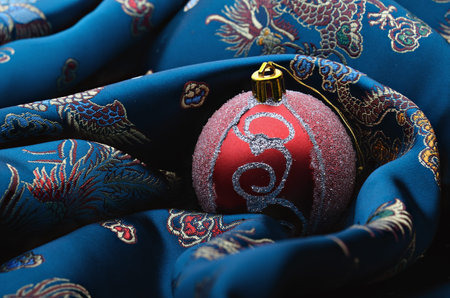 Christmas-tree decorations (balls) on a  dark blue background