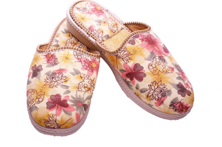 pair of home slippers isolated on white backgroundの写真素材