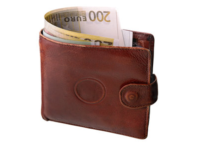 Monetary denominations in a purse on a white background