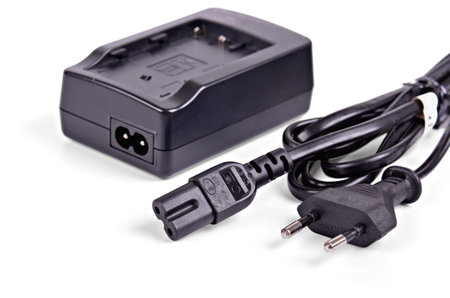 Battery charger with cable on white background