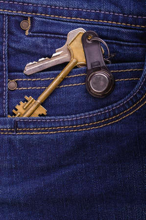 bunch of keys in the pocket of jeansの写真素材