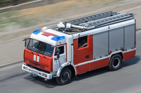 Fire car moving on the road 