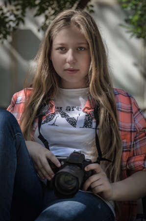 Portrait of a young teen girl in the shadeの写真素材