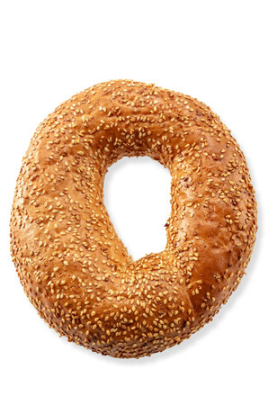 Fresh breakfast bread bagel roll with seeds isolated on white background