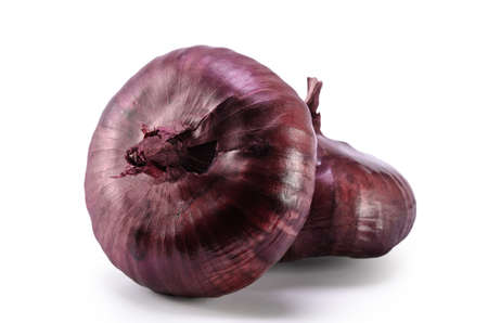 red onion on white background with soft shadowの写真素材