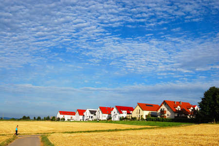 Tranquil landscape - hay fields and house range, south-western Germanyの写真素材