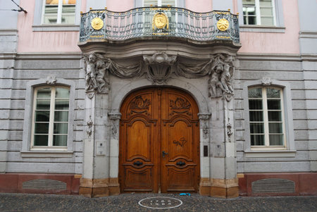 Massive wooden door to medieval mansion, Freiburg, Germanyの写真素材