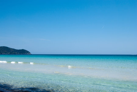 Calm Mediterranean Sea under solid blue sky, Mallorca island, Spainの写真素材