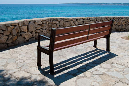 Empty seaviw bench in Cala Bona, Majorca island, Spainの写真素材