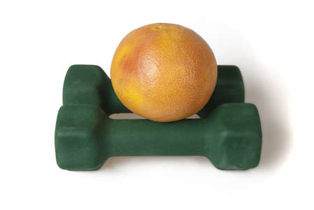 Dumbbells and grapefruitの写真素材