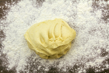 Part of a series showing the preparation of cinnamon rolls.