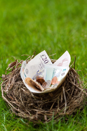 Nest filled with Btitish money. This nest was an abandoned nest found in a hedge that was being removed.の写真素材
