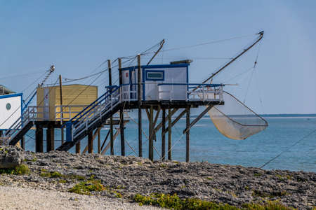 Squares, small wooden house to shelter fishermen, with their square net, on the Atlantic Coast in France.の写真素材