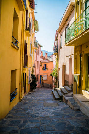 Colorful alleyway in the pretty village of Collioure e, Franceのeditorial素材