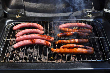 Grilled sausages on the barbecue.の写真素材
