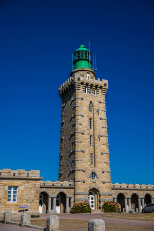 Cap Fr?hel, with pink sandstone rocks, is in the C?tes d'Armor in Brittany. It has a 32-meter high lighthouse.のeditorial素材