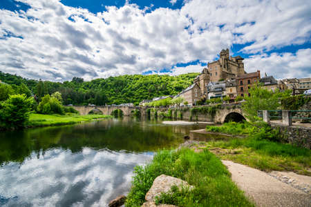 Estaing - beautiful village of France in Aveyron- historic tourist village with castle, river and bridgeのeditorial素材