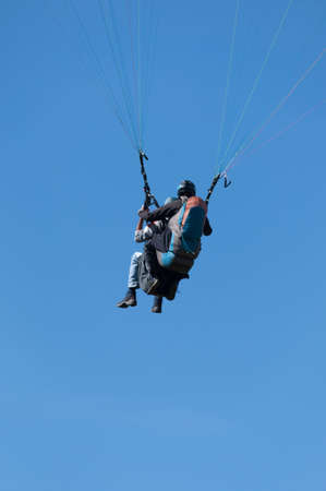 Paraglider in the Aveyron sky above the Millau viaduct.の写真素材
