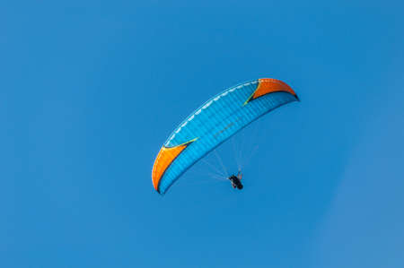 Paraglider in the Aveyron sky above the Millau viaduct.の写真素材