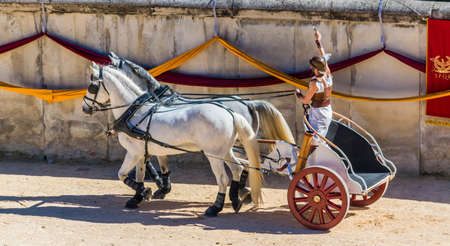 Reconstruction, in arenas, of a Roman chariot race.の写真素材