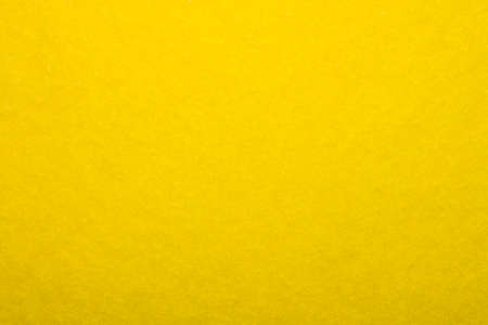 a vibrant yellow solar fabric textureの写真素材