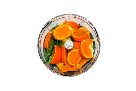 Fruits and vegetables in blender on white background. Smoothies in blender of fruits and vegetables on white background.の写真素材