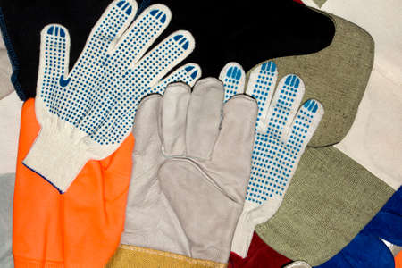 Working gloves and mittens in assortment.の写真素材
