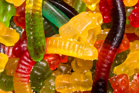 Marmalade background.Candy stretching marmalade.Marmalade colored toffee.