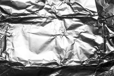 Texture of crumpled silver foil.Crumpled foil background.の写真素材