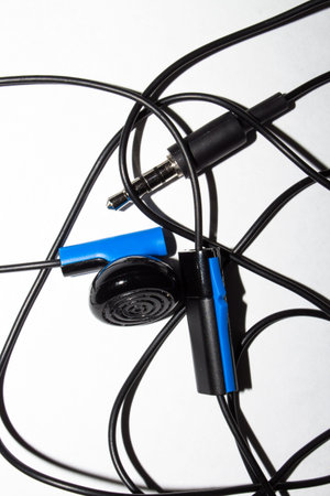 Headset earphone with MIC wired on a white background.
