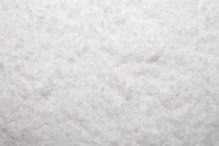 Texture of white table salt.Background of salt.