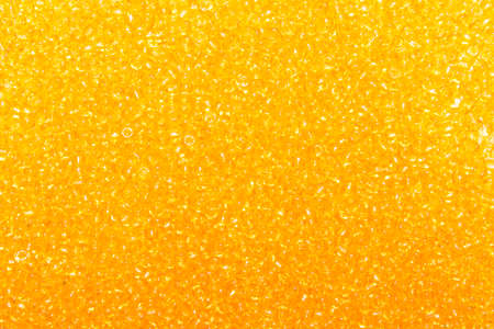 Background of yellow amber beads.Texture of yellow beads.の写真素材