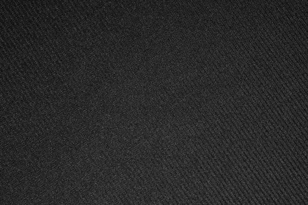 Black and white fabric background.The texture of the fabric is dark gray.