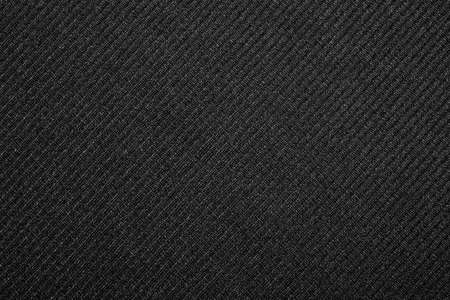 Black and white fabric background.The texture of the fabric is dark gray.の写真素材