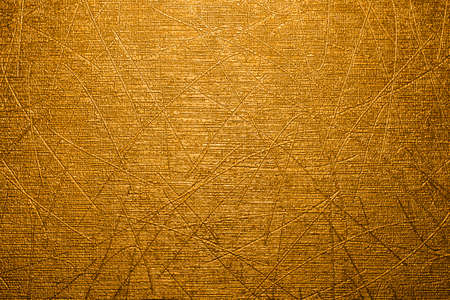 Gold background with scratches.Texture is gold.の写真素材