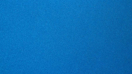 Blue light fabric texture.Turquoise braided fabric background.の写真素材