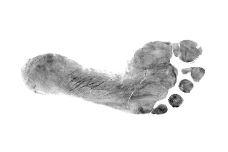 The imprint of a man's bare foot on a white background.