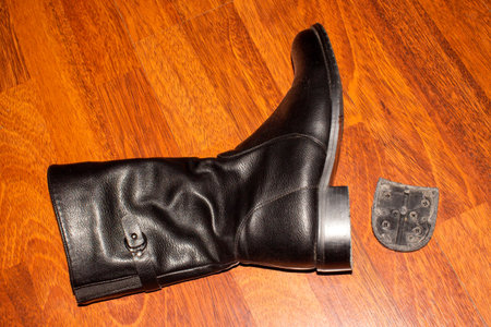 A broken heel on a Shoe.Shoe padding on shoes.Shoe repair.