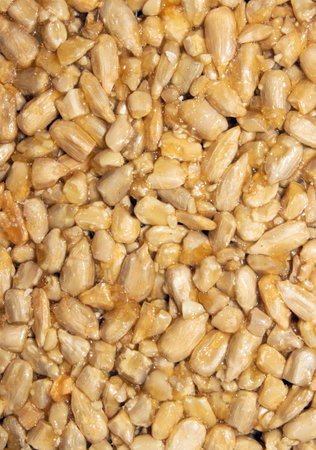 Brittle.Sunflower seeds with honey.Texture of peeled sunflower seeds.