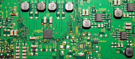 Electronic green printed circuit Board.Chip background.Texture of a computer chip with many...