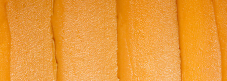 Light brown peanut paste made from whole nuts.Peanut paste background top view.Peanut paste texture...