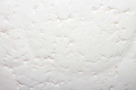 Homemade rustic Russian cottage cheese. Cottage cheese home background. The texture of eco-friendly cottage cheese.の写真素材
