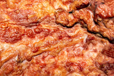 Smoked pork meat for pea soup. Smoked pork ribs. Meat background of smoked meat. Texture of smoked...