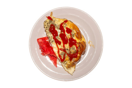 Omelet of chicken eggs, cooked at home.Scrambled eggs cooked in the oven.Egg omelet with spices.