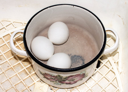 Boiled chicken eggs.Hard-boiled eggs.Chicken eggs in cold water.
