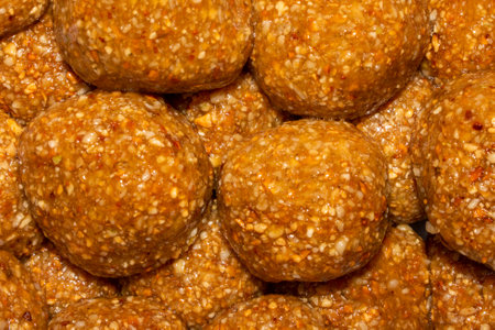 Homemade kozinaks made from seeds and nuts.Kozinaki with honey.Nuts and seeds with honey.Kozinaki background.Ground seeds with honey.の写真素材