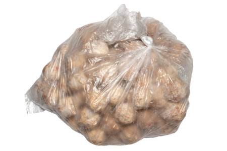 Meatballs are frozen semi-finished products in a bag.Minced meat meatballs.Beef meatballs.Meatball background.の写真素材
