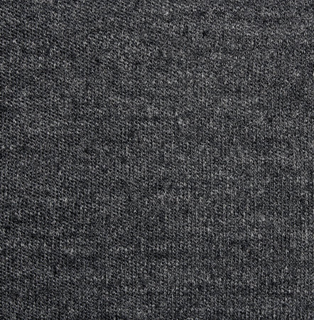 The texture of gray woolen woven fabric.The gray woolen background is made of fabric.Thick gray coat.Wool photo.の写真素材